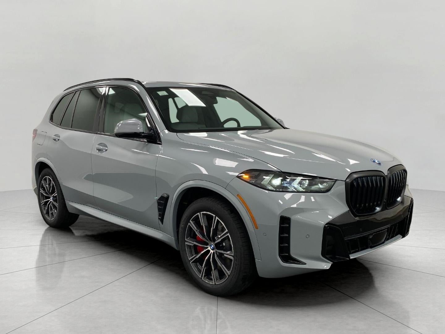 2026 BMW X5 xDrive50e Plug-In Hybrid in Other — front three-quarter view