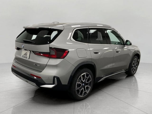 2027 BMW X1 — rear three-quarter view